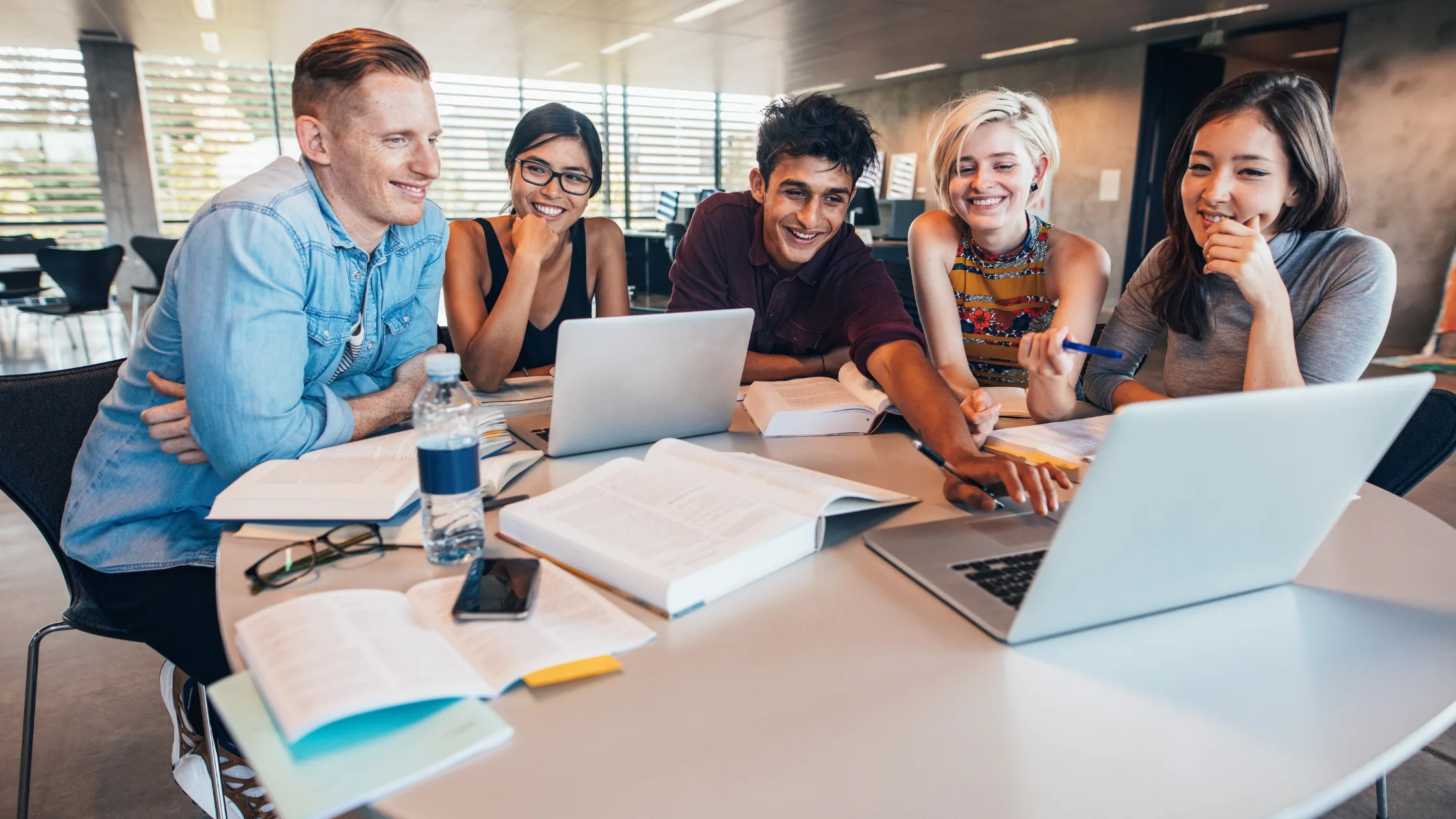 Students relaxing at their CRPM off-campus rental near Kent State University
