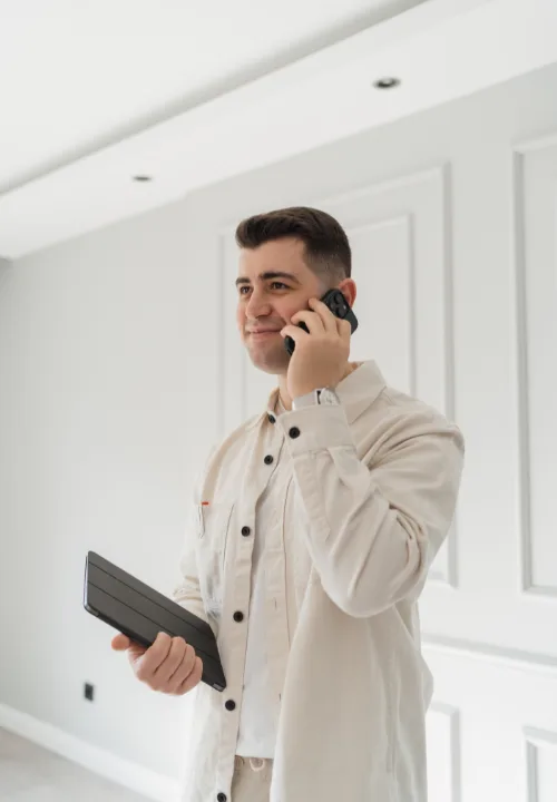CRPM team member discussing property management over the phone